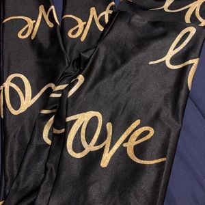 Size small super cute love leggings by goldsheep.